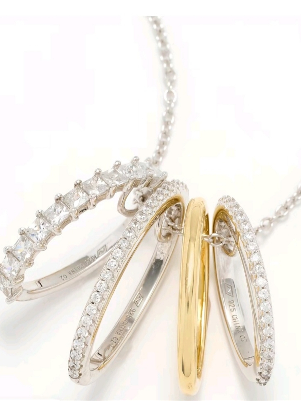 Brand New Sterling Silver Four Ring Charm Necklace A Beauty